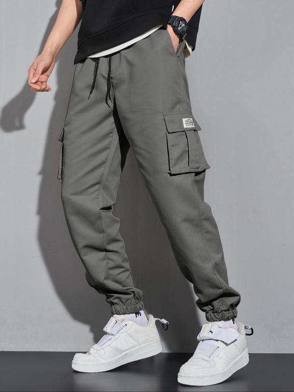 Men's Letter Patched Pocket Cargo Pants, Stylish Loose Drawstring Trousers, Drippy Outfits, Going Out Outfit, 2000s Pants, Menswear Clothing, Men's Clothing Outfits