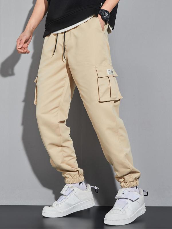 Men's Letter Patched Pocket Cargo Pants, Stylish Loose Drawstring Trousers, Drippy Outfits, Going Out Outfit, 2000s Pants, Menswear Clothing, Men's Clothing Outfits