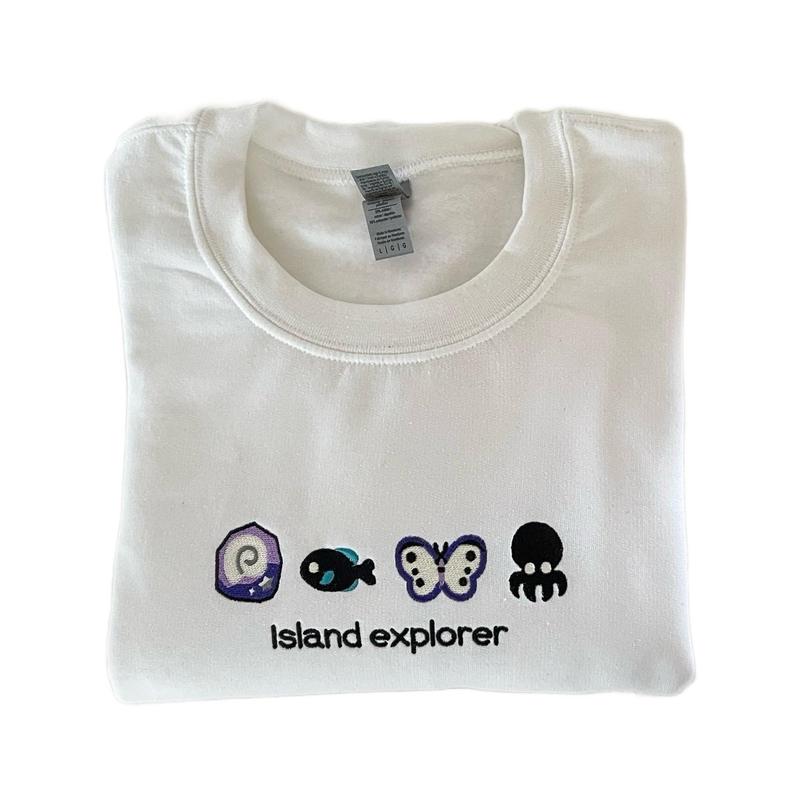 Island essentials or explorer embroidered sweatshirt unisex