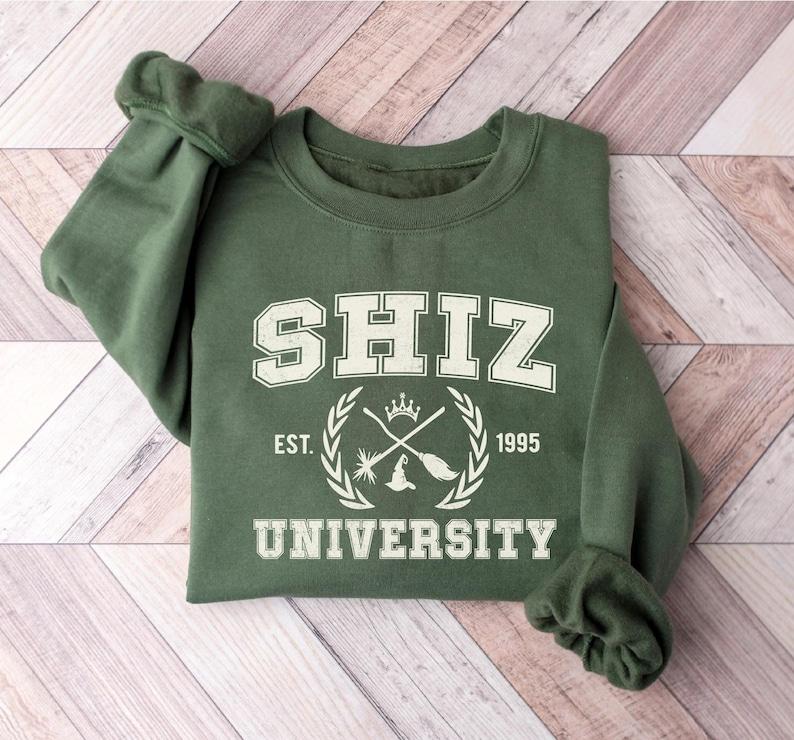 Shiz University Sweatshirt, Wickeds Shirt, Wizard Shiz Uni Shirt, Musical Movie Sweater, Defy Gravity Broomstick Magic Wand Shirt