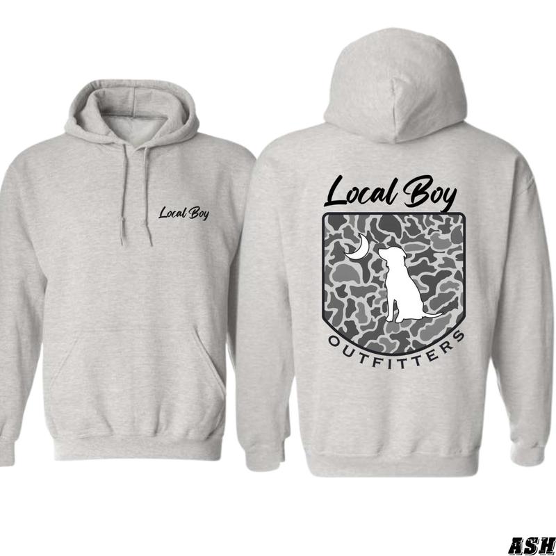 Local Boy Outfitters Hoodie - Classic camouflage design featuring a dog and moon graphic, perfect for nature lovers, unisex hoodie offering comfort and made for wilderness explorers, designed for men.