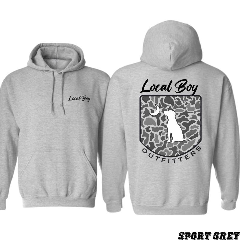 Local Boy Outfitters Hoodie - Classic camouflage design featuring a dog and moon graphic, perfect for nature lovers, unisex hoodie offering comfort and made for wilderness explorers, designed for men.